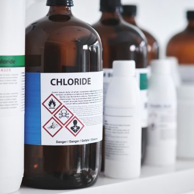 Shot of bottles of chemicals on a shelf in a lab